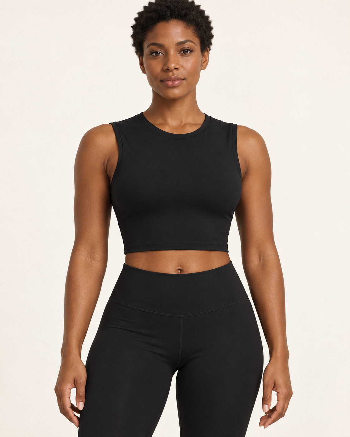 ALMA Sculptflex medium support sports bra in black — front view