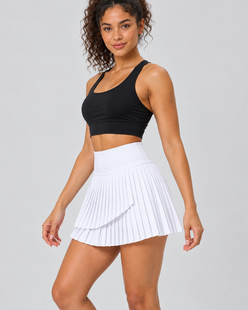ARIA white pleated skort — three-quarter