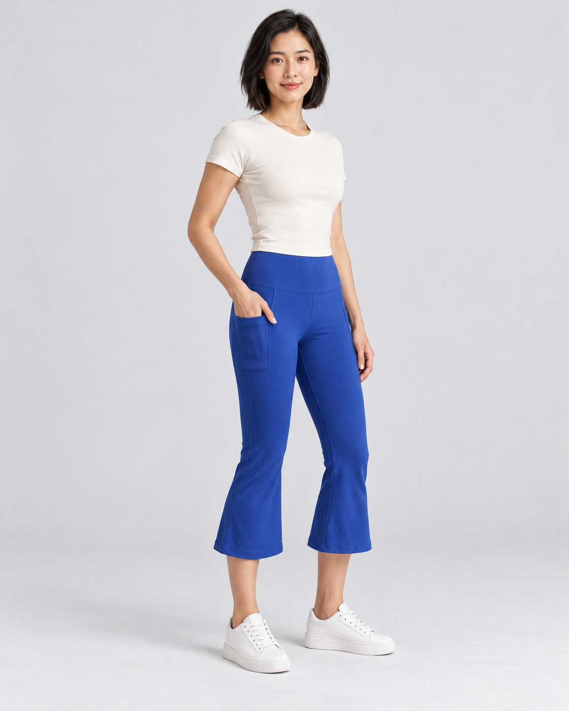 AWA dark-blue capri flare pants - three-quarter view