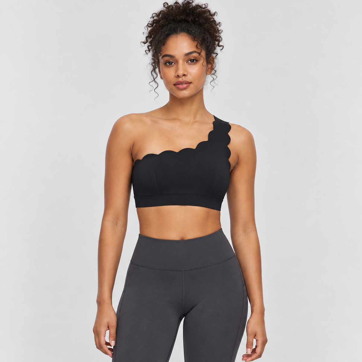 EMY BLACK one-shoulder sports bra - front view