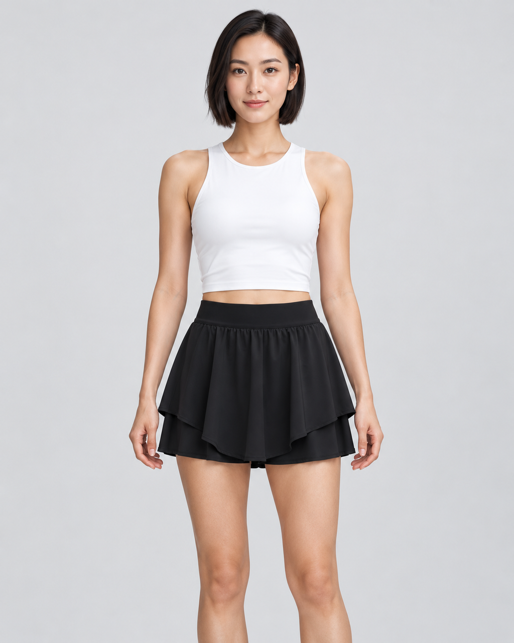 KIRA black high-rise skort — front view