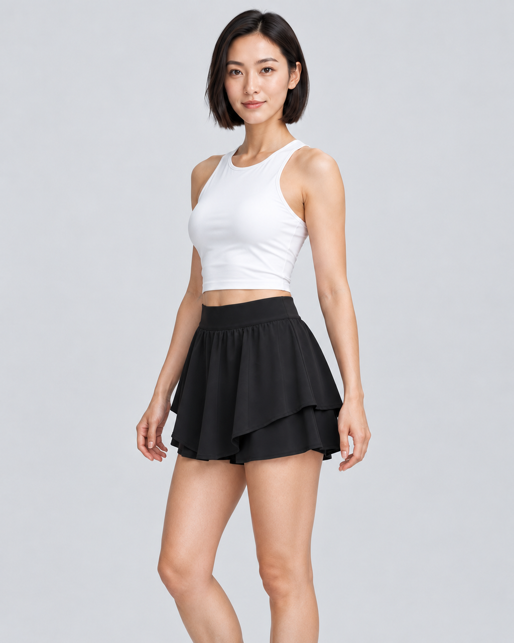 KIRA black high-rise skort — three-quarter