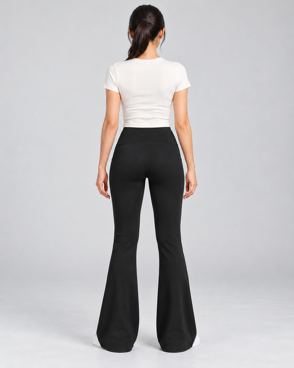LENA black high-waisted flare leggings — back view