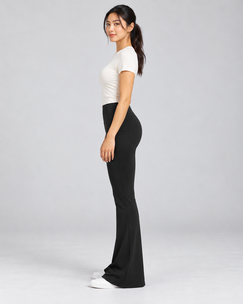 LENA black high-waisted flare leggings — side view