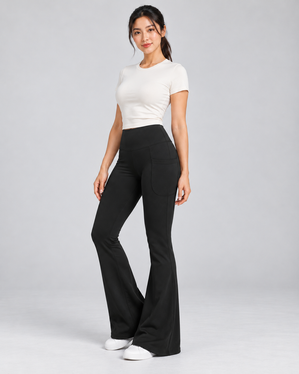 LENA black high-waisted flare leggings — three-quarter view