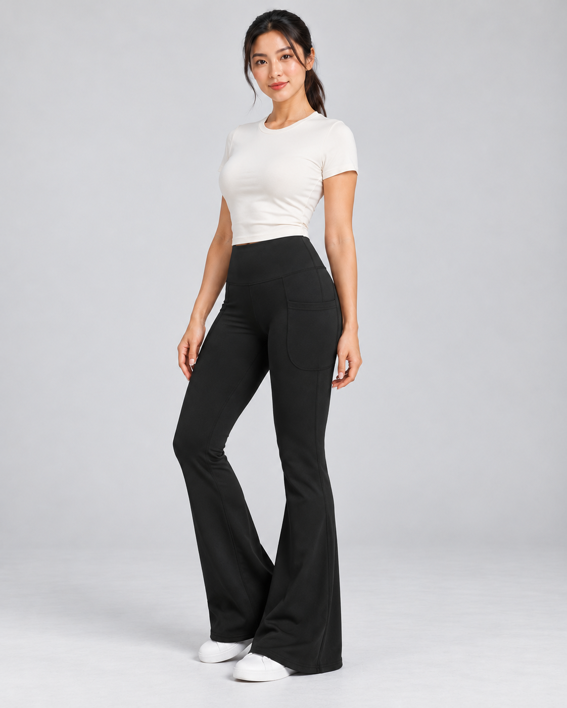 LENA black high-waisted flare leggings — three-quarter view