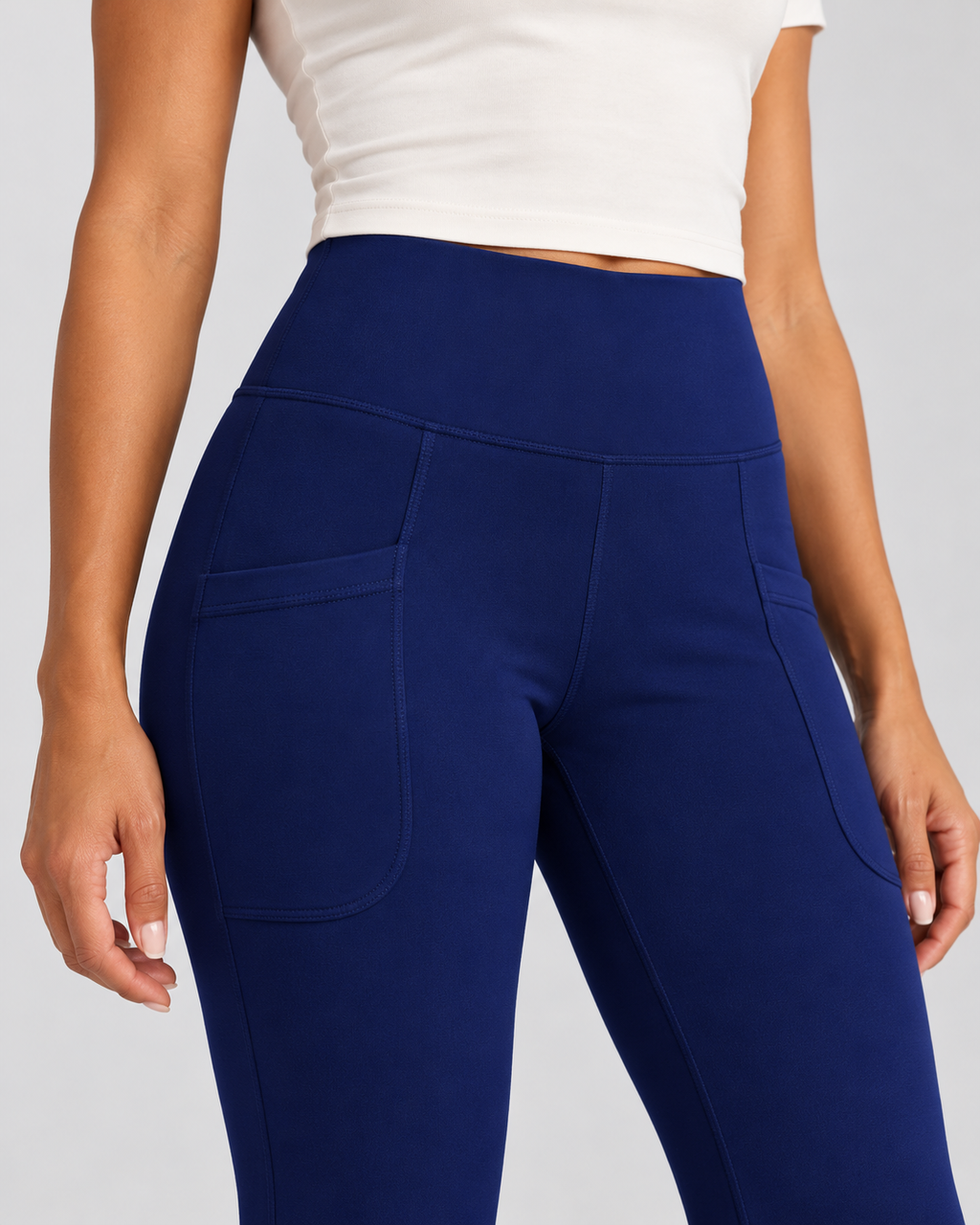 LENA navy blue high-waisted flare leggings — pocket and fabric detail